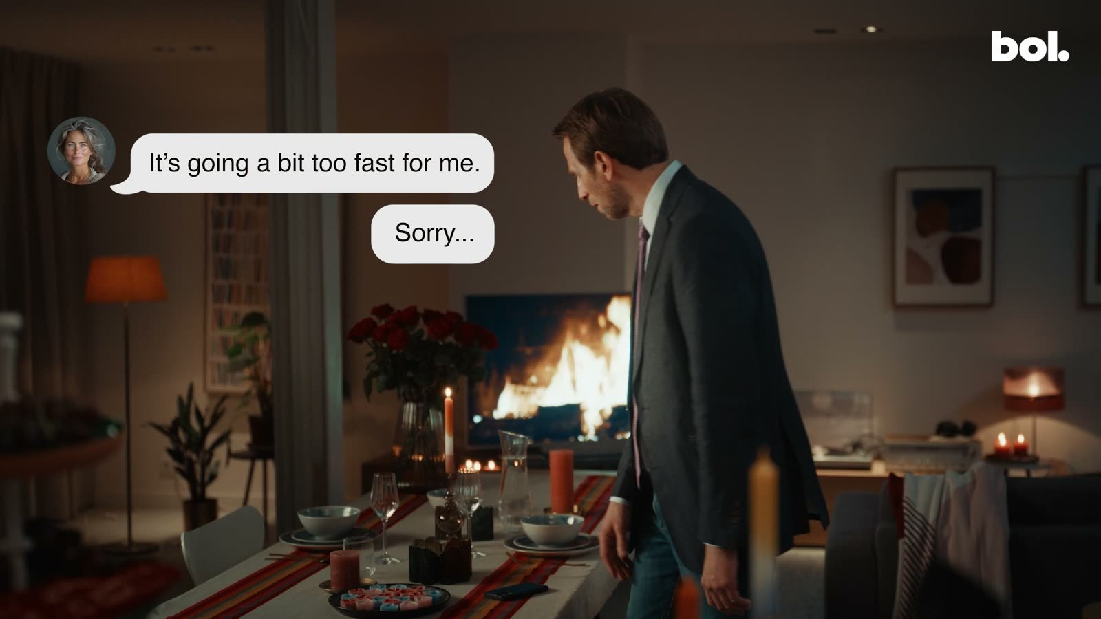 Sonic branding for retail: a man at a candlelit dinner table reads chat messages in a Bol TV commercial